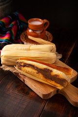 Tamales. Traditional dish typical of Mexico and some Latin American countries. Corn dough wrapped in corn leaves. The tamales are steamed.