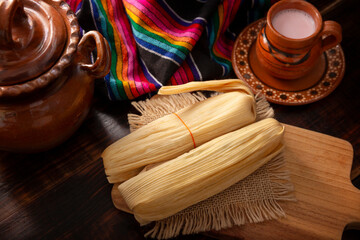 Tamales. Traditional dish typical of Mexico and some Latin American countries. Corn dough wrapped in corn leaves. The tamales are steamed.