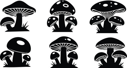 Fototapeta premium Flat silhouette mushroom icon set in two row grid showing six front facing toadstools with varied cap shapes grass tufts stacked stems decorative gills bold black vector art