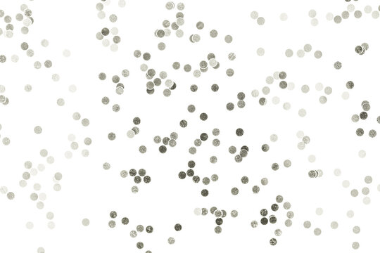 Sparkling silver confetti dots scattered on a clean white surface, creating a festive abstract pattern for celebration events. Color of 2026 year dancer in the white cloud