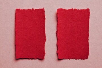 Red Torn Paper Strips on Pink Background