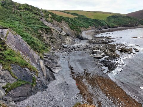 rocky coastal cliffs and shoreline - Powered by Adobe