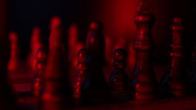 Animated sequence showing chess pieces on revolving board, capturing the essence of strategic decision-making and the black versus white dichotomy in chess, An alarming red light, the colors became