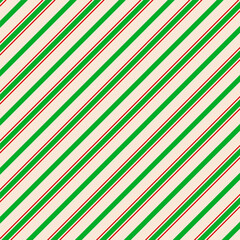 Obraz premium Striped candy cane Christmas pattern. Christmas background. Holiday present wrapping paper, wallpaper. Christmas food.