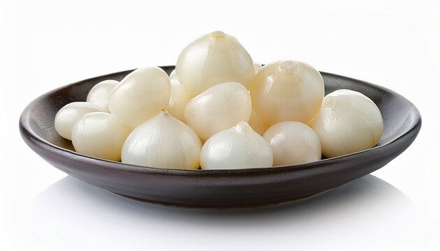 peeled pearl onions on white background