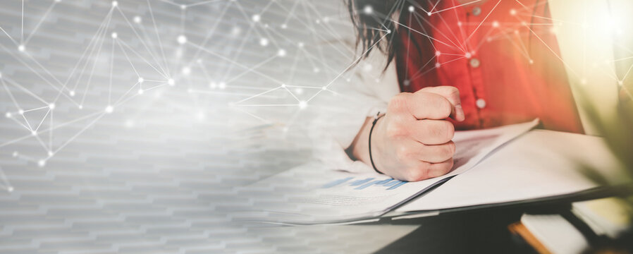 Angry businesswoman at her workplace; panoramic banner - Powered by Adobe