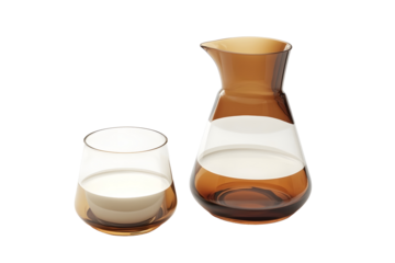 Glass and jug with milk isolated on white