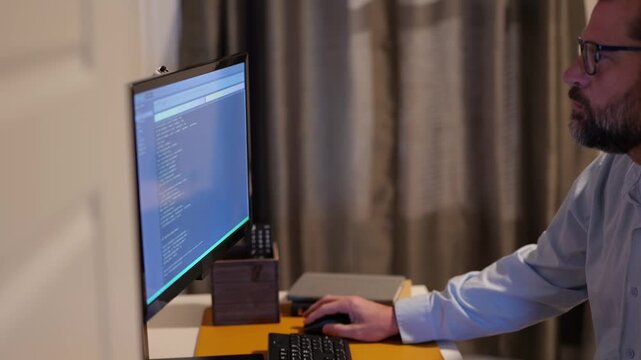 Middle Aged Man Vibe Coding Crypto Coin with Artificial Intelligence Large Language Model Tools - Custom IDE App for AI Code