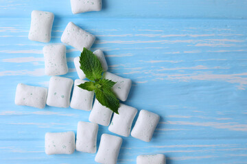 mint chewing gum and mint on the table. Fresh breath, oral care 
