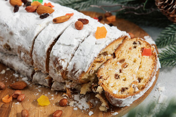 stollen cake on wooden board during festive season celebration