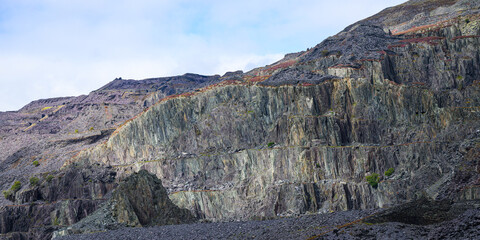 Welsh mountain carved in vertical pattern by industrial slate workings