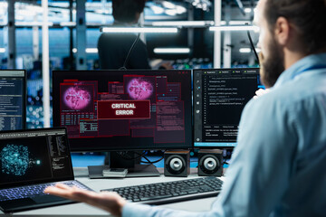 Close up of data center software developer using AI LLM assistant to fix critical errors affecting infrastructure. Server room IT worker using large language model chatbot to eliminate computer bugs