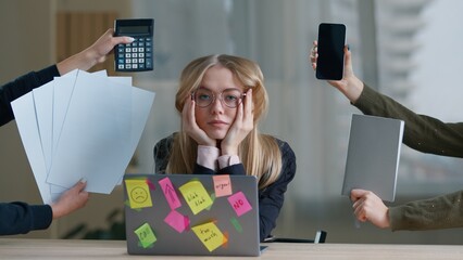 Stressed business woman in office female hands giving phone notebook papers calculator from sides multitasking frustrated businesswoman girl holding head feeling pressure overload overworked burnout
