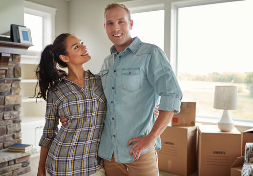 Couple, moving and smile with hug in new home, portrait and fresh start with boxes at property. Man, woman and embrace with relocation, excited or happy with real estate investment at house in Italy - Powered by Adobe