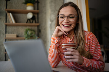 Woman smiling while having video call
