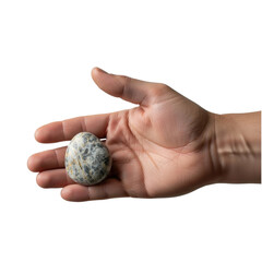 Smooth polished egg-shaped mottled stone held gently in the open palm of a person's hand, showcasing its natural grey and black mineral patterns and texture