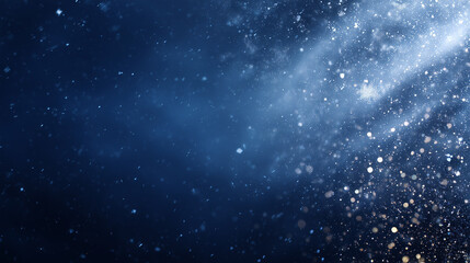 Blue winter snowfall background with glittering bokeh for festive designs