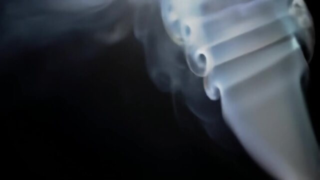 Medical X-ray of human shoulder joint with visible bone structure and surgical screws in dark setting