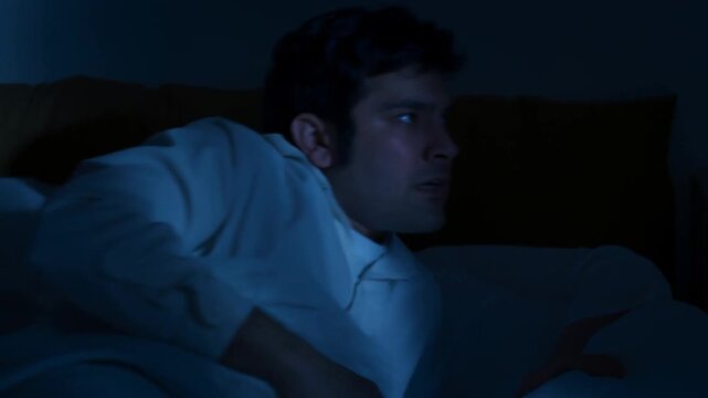 A man's troubled expression at night Stock Video