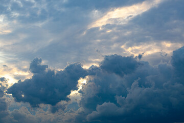 Dark blue clouds are gathering in the sky.