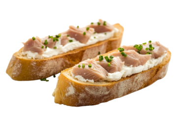 Slices of baguette with fresh tuna cream cheese and chopped onion chives on marble board Christmas themed dinner table isolated on white background sid