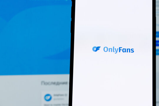 Usinsk, Russian Federation - December 04, 2025: Smartphone displaying OnlyFans app logo on screen, with blurred background showcasing social media interface and vibrant colors