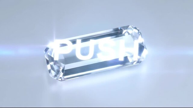 Clear crystal cylinder with the word PUSH embossed in white letters, soft light