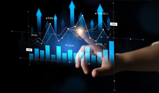 A hand interacts with a digital graph showcasing business growth and statistical data. This image represents analysis, success, and modern technology trends in finance. Scalp - Powered by Adobe