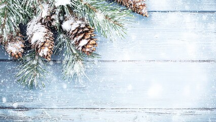 Christmas Tree Branches with Snow Pine Cones on Rustic Wooden Background Festive Holiday Season Decorations Winter Scenery