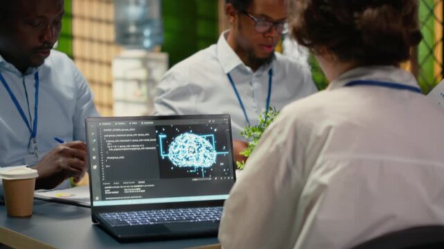 Programmers in office using specialized technology to accelerate complex AI calculations. IT workers managing neural network training datasets with notebook device, camera B