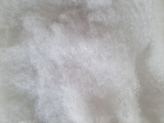 A white fluffy background that looks like clouds or snow