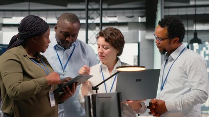 Engineering team working in AI startup training predictive models for language processing tasks. Artificial intelligence tech specialists use technical expertise for complex IT requirements, camera B