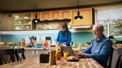 Aged wife and husband arguing with visible frustration and rage, troubled moment between distraught couple dealing with conflict, unhappiness and relationship difficulties in retirement. Camera A. - Powered by Adobe