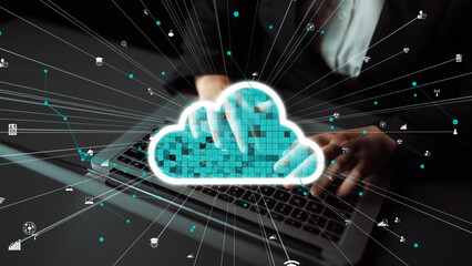 A conceptual image showcasing hands typing on a laptop with a cloud graphic overlay, representing digital transformation in technology and cloud computing environments. Xenic
