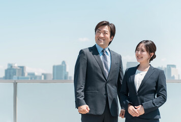 Employment, job change, recruitment, men and women in suits standing in the blue sky, businessmen and businesswomen
