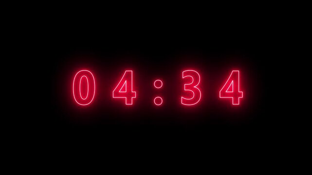 Red Neon Digital Clock Displaying 05:00 Against Black Background glowing