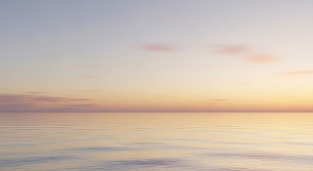 Obraz premium Peaceful horizon over calm water during a soft and serene sunset