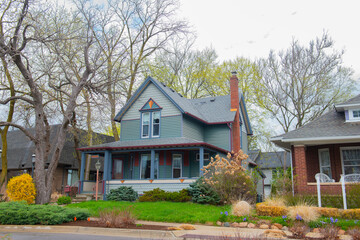 Historic residential building at 33436 Oakland Street at Center Square in historic city center of Farmington, Michigan MI, USA.