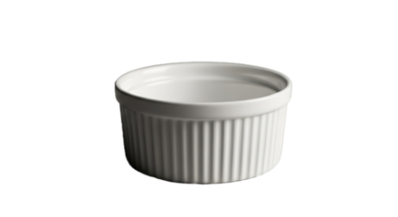 Single white fluted ceramic ramekin dish isolated on a stark black background