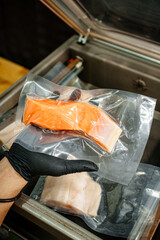 Frozen salmon fillet, showing fresh texture and bright orange color