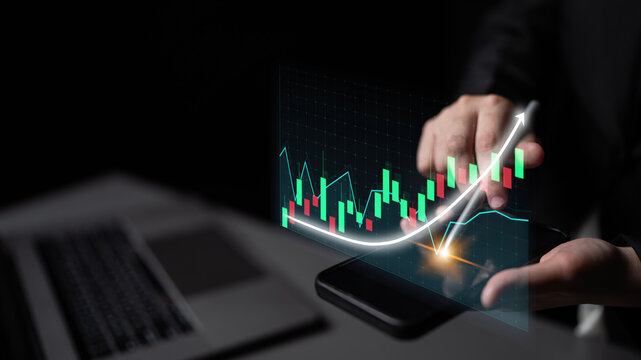 A businessperson evaluates stock market trends using a smartphone and laptop, showcasing vibrant data charts and growth indicators in a sophisticated dark setting. Impute