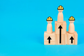 A workforce improvement concept represented by ascending cubes with worker icons, symbolizing skill development, career progress, productivity, and professional growth.
