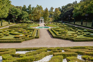 Yeomiji Botanical Garden, Breathtaking formal garden with intricate hedges and a central fountain, a stunning highlight of Jeju Islands natural beauty