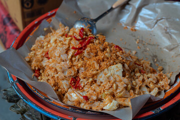 Traditional Indonesian Urap Sayur cooked with spicy grated coconut and chili
