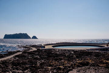 Stunning infinity pool overlooking the ocean on Jeju Island, offering a luxurious escape for travelers