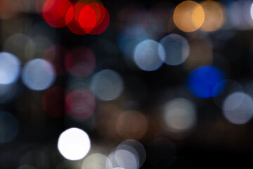 Blurred night background with colorful bokeh, copy space