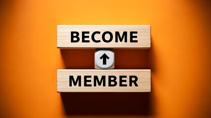 Wooden blocks spell out become member with up arrow symbol