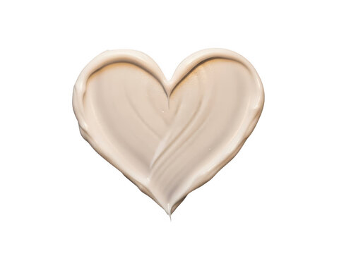 Creamy cosmetic makeup foundation swatch shaped like a heart isolated on transparent background for beauty and skincare concept