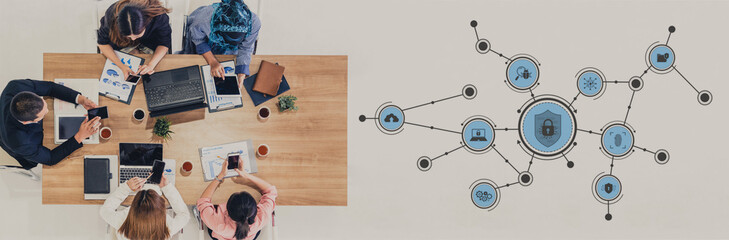 A top-down view of a diverse team engaging in a collaborative meeting in a modern office. Digital security icons illustrate the emphasis on technology and protection. Tessel