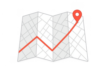 Folded map showing navigation route with a red location pin, finding destination journey path planning
